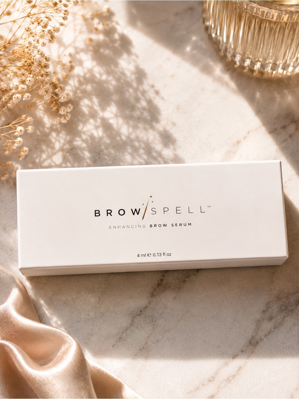 Spell Enhancing Brow Serum in White and Gold Accents